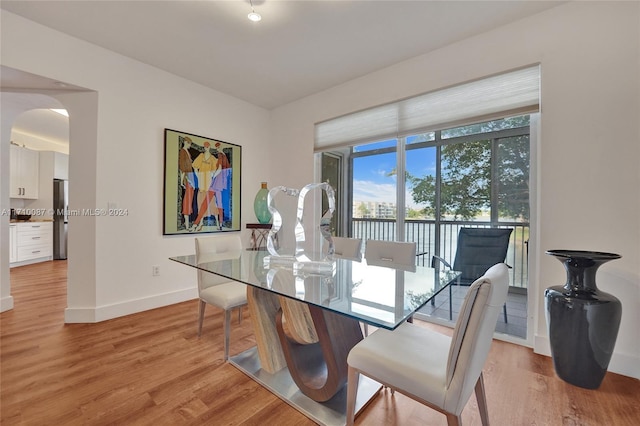 dining room featuring light hardwood / wood-style floors