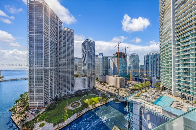 property's view of city featuring a water view