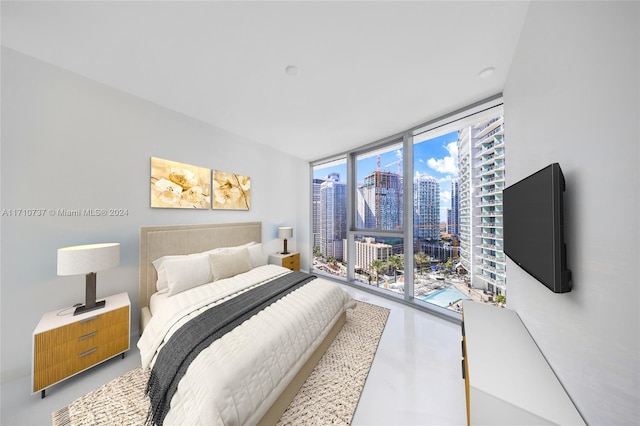 bedroom with access to outside and floor to ceiling windows