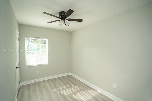 unfurnished room featuring ceiling fan and light hardwood / wood-style floors