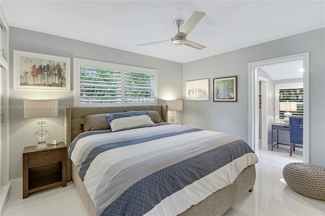 bedroom with ceiling fan and light tile patterned floors