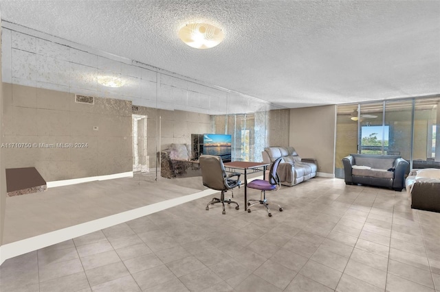 home office with a textured ceiling