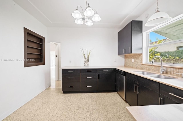 kitchen featuring sink, hanging light fixtures, stainless steel dishwasher, tasteful backsplash, and a notable chandelier