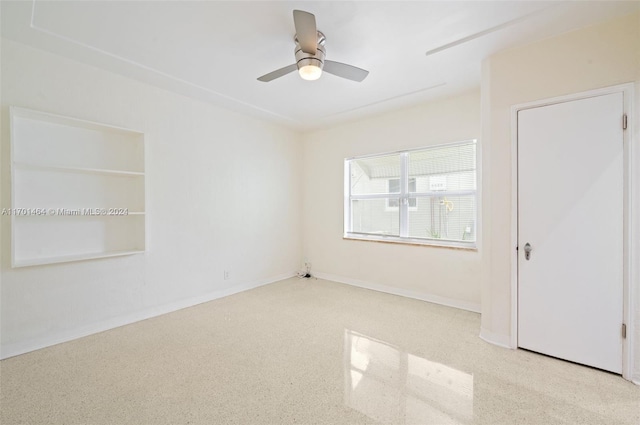 unfurnished bedroom with light colored carpet and ceiling fan