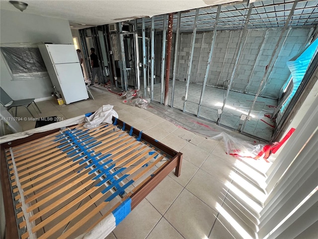 miscellaneous room with tile patterned flooring