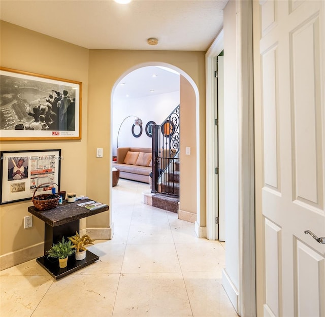 hallway featuring light tile patterned floors