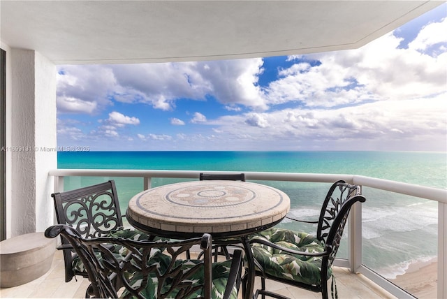 balcony featuring a water view