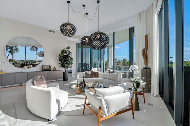 living room with an inviting chandelier