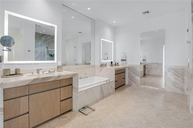 bathroom with a shower with shower door