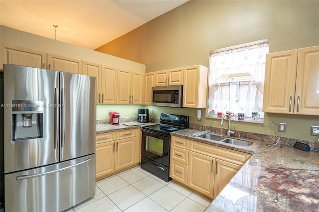 kitchen with stainless steel appliances, sink, light tile patterned floors, light brown cabinets, and high vaulted ceiling