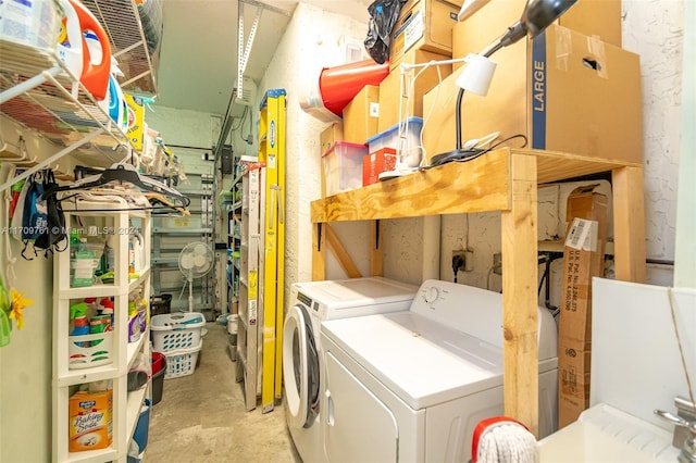 washroom featuring washing machine and dryer