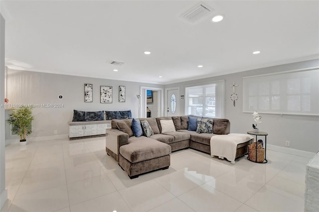 living room with light tile patterned floors