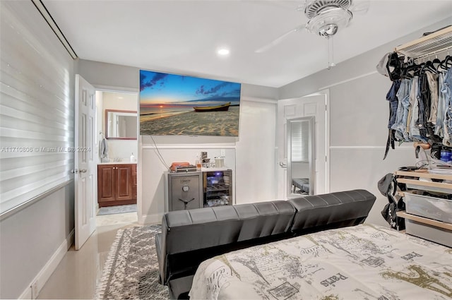 bedroom with ceiling fan and ensuite bathroom