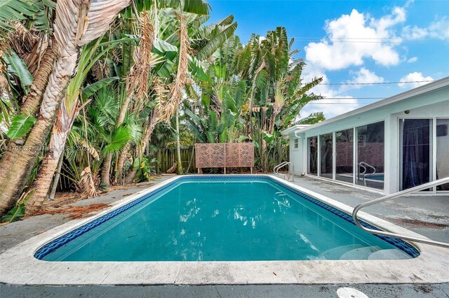 entrance to property with a patio area