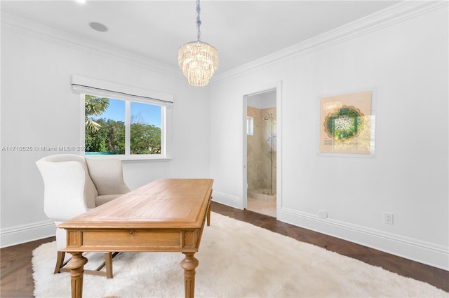 office space featuring dark hardwood / wood-style floors, a notable chandelier, and ornamental molding