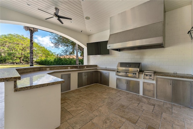 view of patio / terrace with sink, an outdoor kitchen, grilling area, and ceiling fan