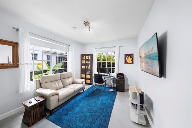 bedroom featuring french doors, a closet, and ceiling fan