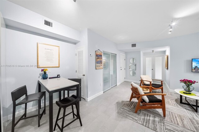 living room with rail lighting