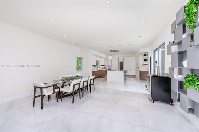 6301 SW 114th St, Pinecrest, FL 33156 - dining space featuring light marble finish flooring and recessed lighting