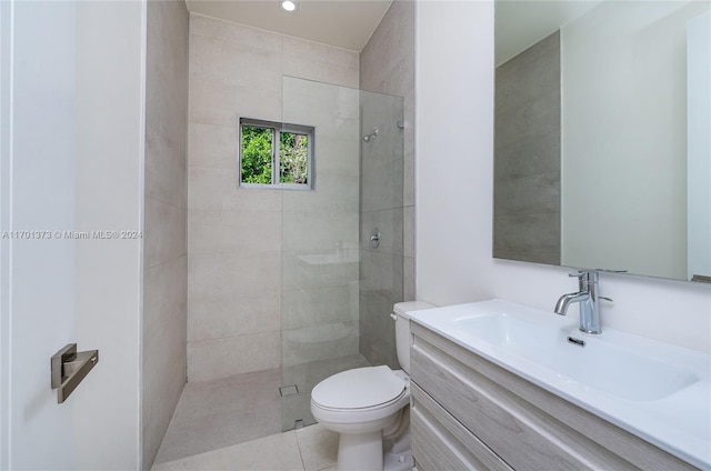 6301 SW 114th St, Pinecrest, FL 33156 - bathroom with vanity, a tile shower, and tile patterned flooring