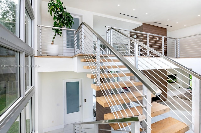 6301 SW 114th St, Pinecrest, FL 33156 - stairway with plenty of natural light, recessed lighting, and a towering ceiling