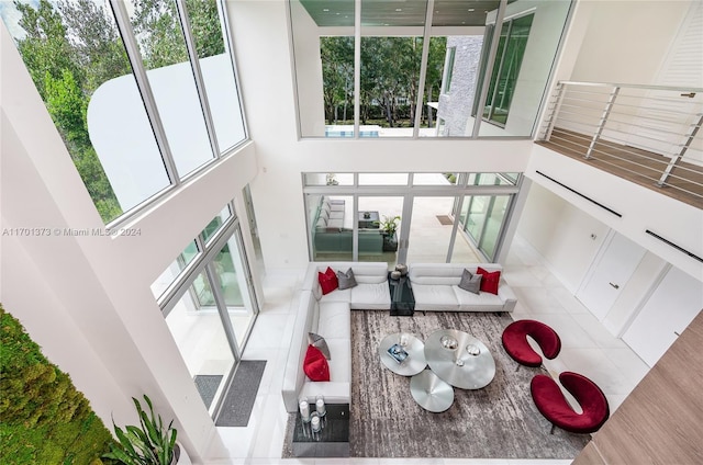 6301 SW 114th St, Pinecrest, FL 33156 - living room featuring healthy amount of natural light and a high ceiling