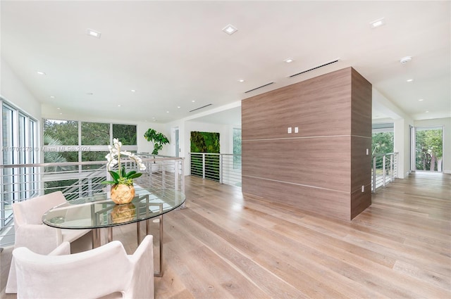 dining room with light hardwood / wood-style flooring