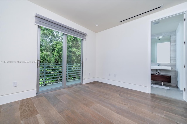 6301 SW 114th St, Pinecrest, FL 33156 - empty room with wood finished floors and baseboards