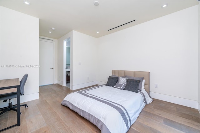 bedroom featuring light hardwood / wood-style floors