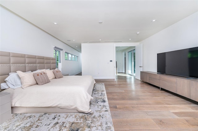 6301 SW 114th St, Pinecrest, FL 33156 - bedroom with light wood-style flooring and recessed lighting