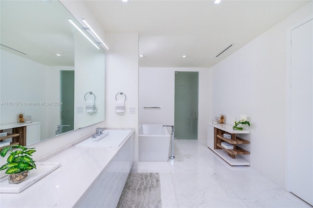 bathroom with a bathtub and vanity