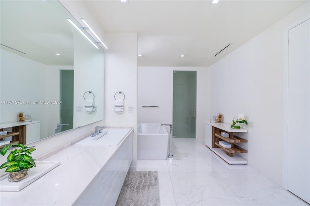 6301 SW 114th St, Pinecrest, FL 33156 - full bathroom with a freestanding bath, double vanity, recessed lighting, and tile patterned floors