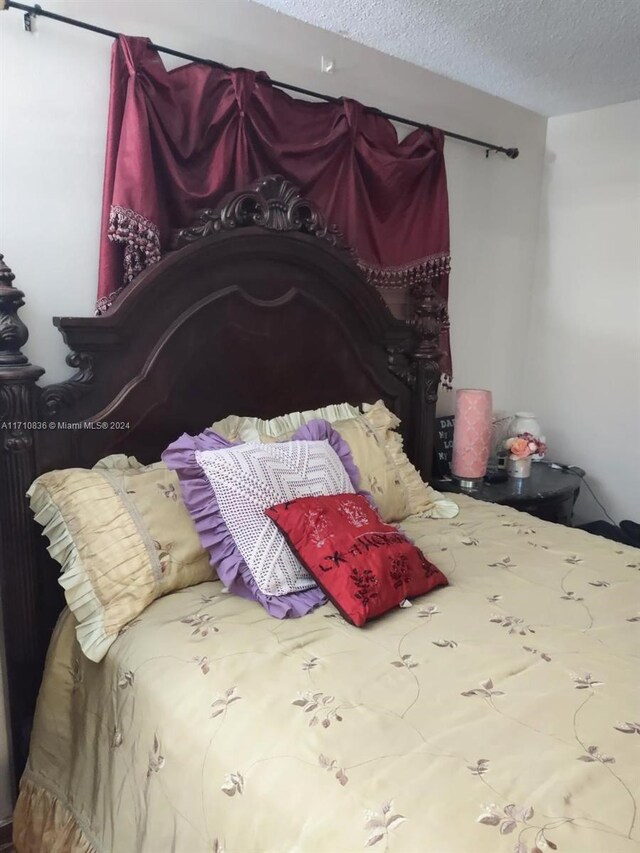 bedroom with a textured ceiling