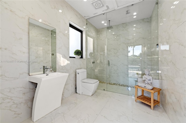 bathroom featuring walk in shower, tile walls, and toilet