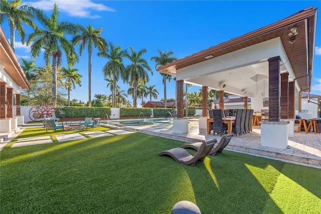 view of yard with an outdoor bar