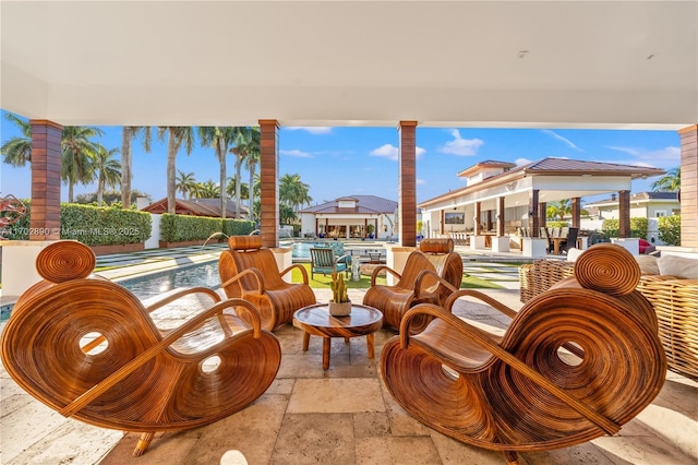 view of patio with pool water feature