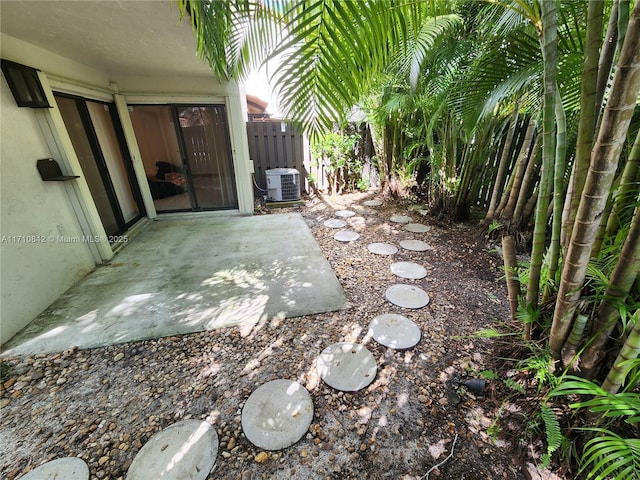 view of patio with central AC