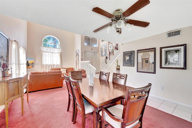 dining room featuring tile patterned flooring and ceiling fan