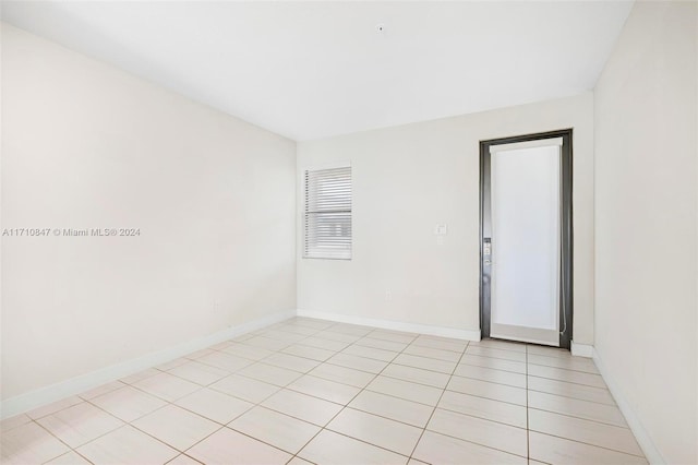 view of tiled spare room