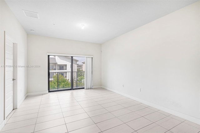 view of tiled spare room