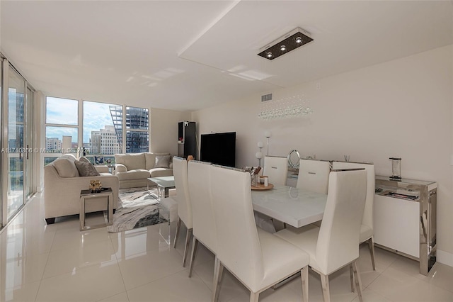 dining room with light tile patterned floors