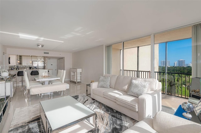 living room with floor to ceiling windows