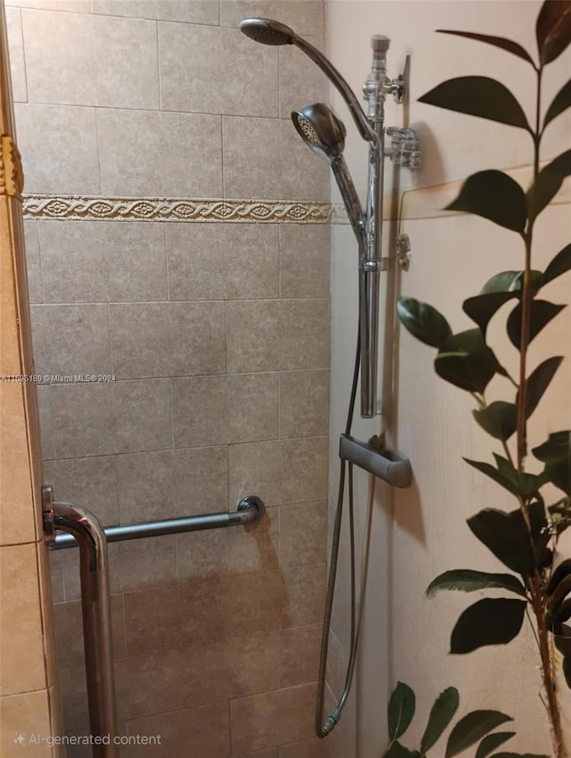 interior details with an enclosed shower