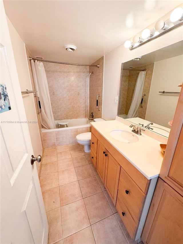 full bathroom featuring vanity, tile patterned flooring, shower / bathtub combination with curtain, and toilet