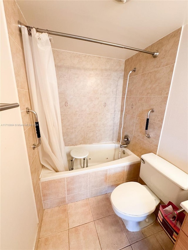 bathroom featuring tile patterned flooring, toilet, and shower / tub combo with curtain