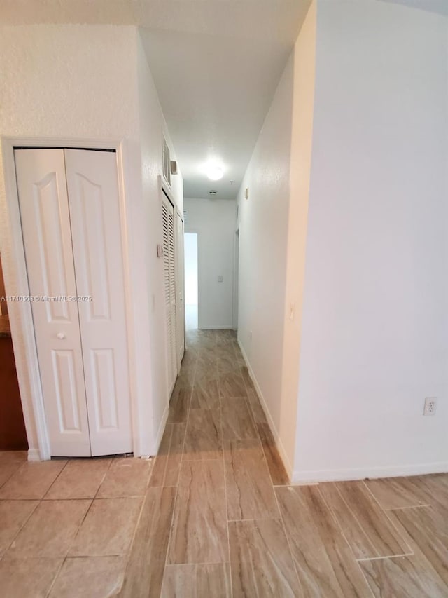 hallway with baseboards