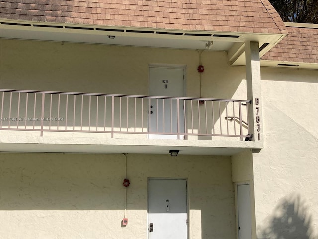 doorway to property with a balcony