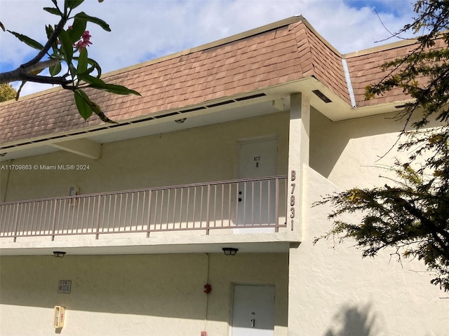 exterior space with a balcony