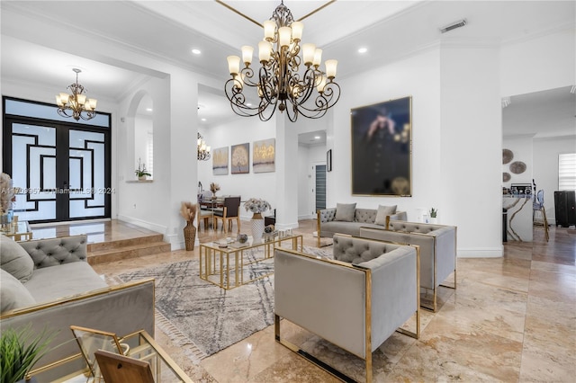 living room featuring french doors, crown molding, and an inviting chandelier