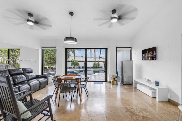 dining space with ceiling fan